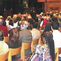 Guests for Thursday's public lecture listen attentively to Dr. King's presentation.